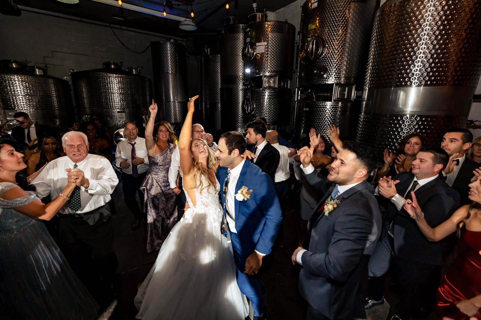 Guests dancing during a lively wedding reception at Brooklyn Winery.