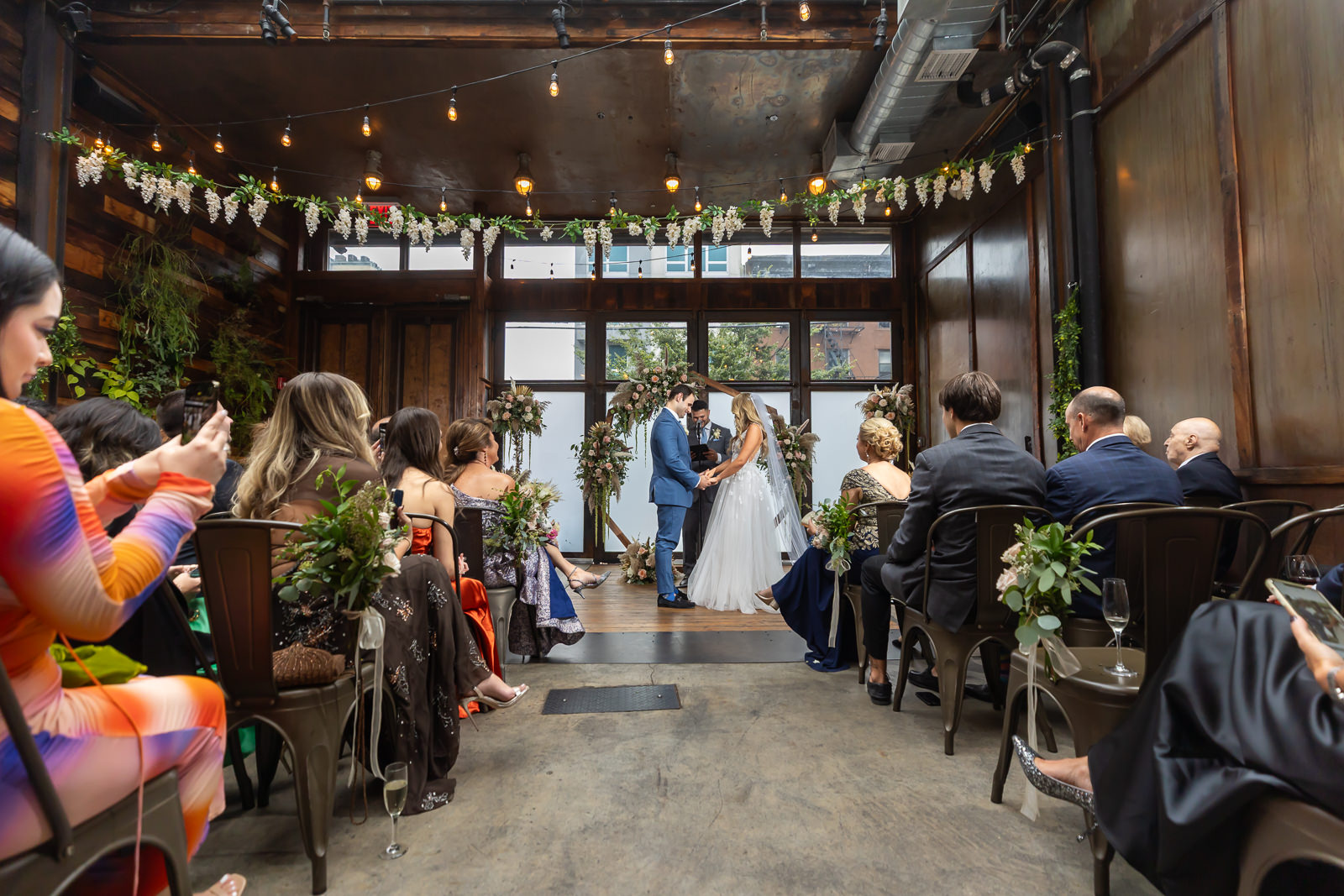 Wide view of ceremony setup inside Brooklyn Winery in Williamsburg.